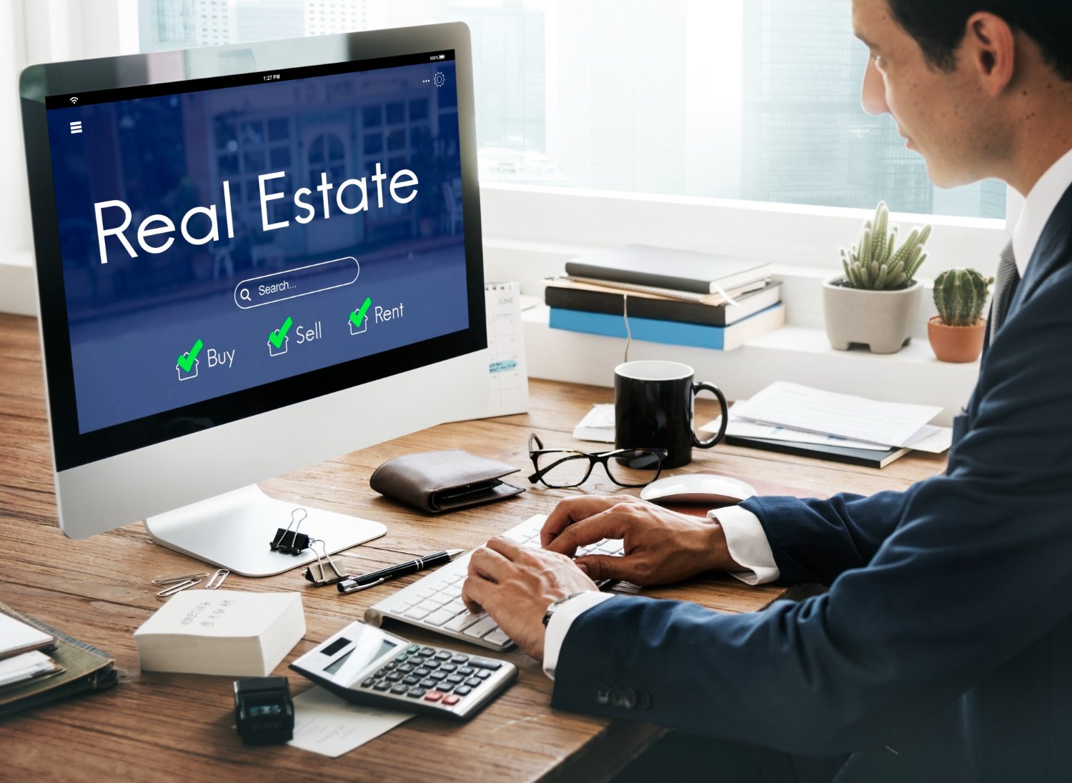 man making real estate signs